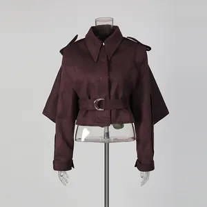 Front view of a dark burgundy French style lapel jacket with waist belt and irregular sleeves