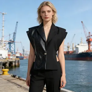 Detail view of chic black PU leather vest with crocodile texture and waist cutout