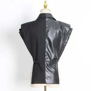 Back view of women's black motorcycle vest featuring PU leather split design detail