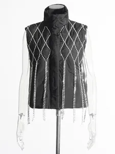 Black padded vest with luxury rhinestone diamond pattern and long fringe tassels on mannequin.