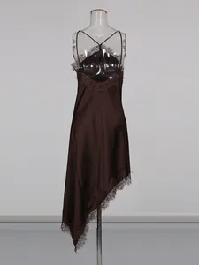 Elegant brown French style satin slip dress with lace trim and asymmetrical hem design