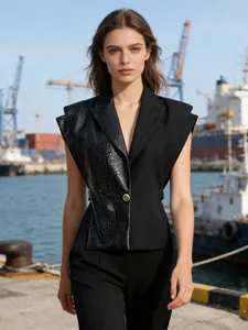 Chic black PU leather vest with crocodile texture and structured shoulders.