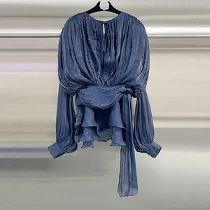 French style blue pleated long sleeve blouse with ruffled hem and tie-waist detail