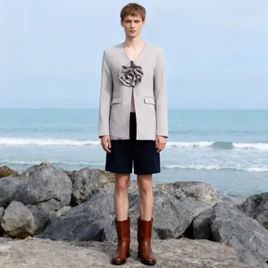 Chic light gray blazer featuring a large 3D flower applique and V-neckline for a modern art style