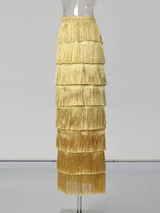 Elegant high-waisted tiered fringe maxi skirt in a radiant golden finish for women