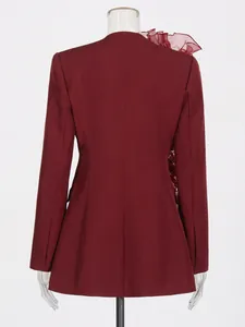 Elegant wine red blazer for women featuring ruffled shoulder detail, back view display