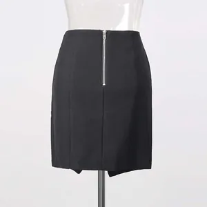 Back view of a chic black pencil skirt featuring a striking silver metal zipper detail