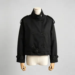 Front detail view of a stylish black short trench coat with belt and epaulettes