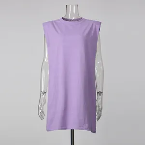 Detail of a casual loose purple sleeveless dress with shoulder pads on a mannequin