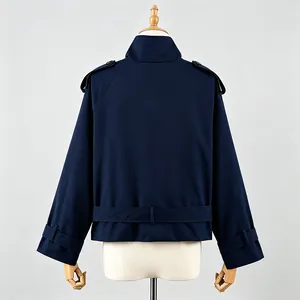 Detailed back view of a classic navy blue women's short trench coat jacket with epaulettes