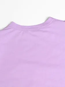 Close-up detail view of the round neckline on a soft lavender summer casual dress