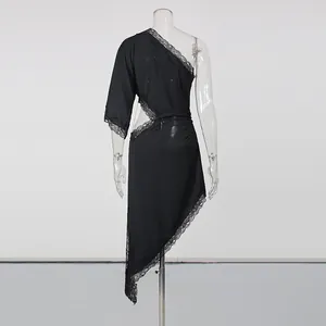 Detailed back view of a black one-shoulder asymmetrical dress with elegant lace trim
