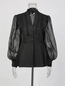 Elegant black V-neck peplum blouse with sheer lantern sleeves and beaded detail