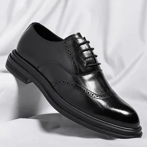 Classic black brogue elevator dress shoes for men with detailed wingtip carving