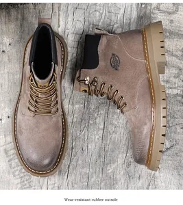 Close-up view of the wear-resistant rubber outsole on vintage brown suede men boots