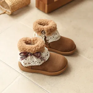 Cozy girls' brown autumn winter boots with elegant lace collar and plaid bow detail