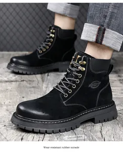 Close-up of men's black leather worker boots with wear-resistant rubber outsole detail
