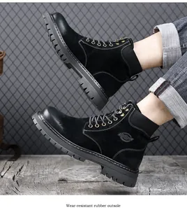 Men's black suede work boots with a thick wear-resistant rubber lug outsole.