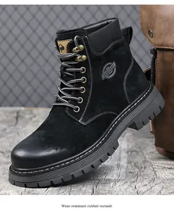 Side view detail of black leather work boot with durable wear-resistant rubber outsole