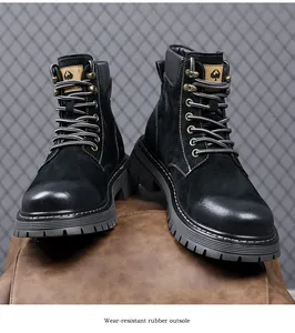 Close-up of black leather combat boots featuring a durable wear-resistant rubber outsole