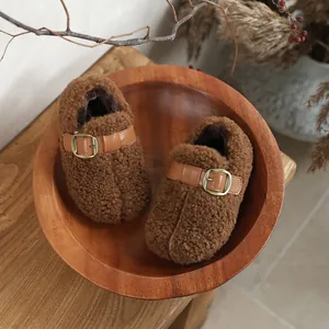 Cozy brown sherpa fleece pig trotter shoes for kids, stylish warm slip-on winter slippers.