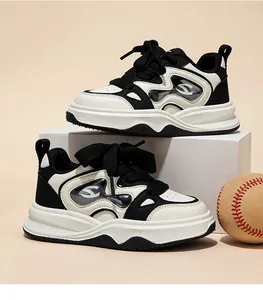 Zapatillas deportivas gruesas en blanco y negro para niñas con cordones