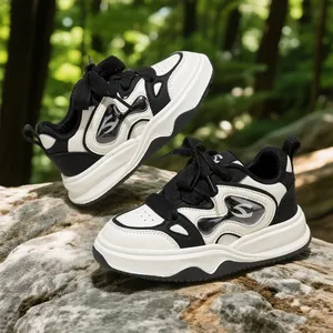 Elegantes zapatillas transpirables con cordones en blanco y negro para niñas y exteriores