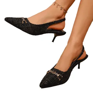 Elegant black tweed slingback kitten heels with pointed toe and metallic buckle