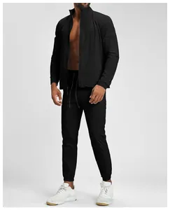 Detailed full-body view of a black quick-dry men's athletic jacket and matching pants.