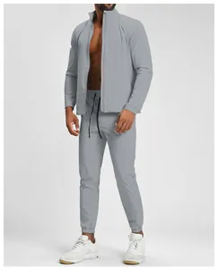 Full view of men's grey quick-dry sports tracksuit for fitness and running