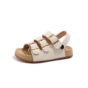 Stylish children's cream sandals with three adjustable buckles and thick cork sole