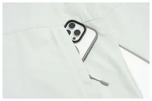 Close-up of functional pocket on men's quick-drying sports jacket for phone storage