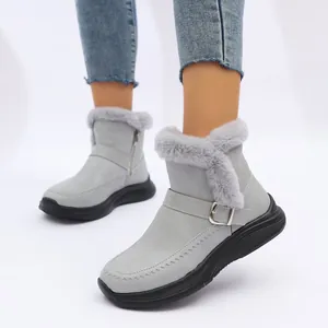 Vue latérale détaillée de bottes de neige grises pour femmes avec doublure en fausse fourrure