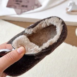 Warm children's retro Birkenstock style shoes featuring a thick cozy plush fur lining
