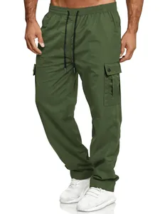 Detail view of men's army green loose cargo pants featuring elastic waist and pockets.