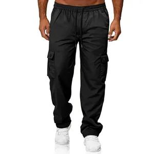 Detail view of men's black straight leg cargo pants with multi-pockets on model