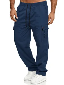 Close-up detail of navy blue men's cargo pants with elastic drawstring waist and side pocket