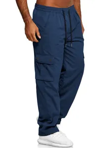 Detailed side view of navy blue cargo pants with functional pockets and drawstring elastic waist