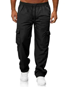 Detailed view of men's black cargo pants with elastic waist and functional side pockets