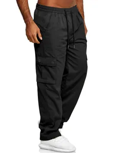 Detailed view of black men's cargo pants featuring elastic waist and utility pockets