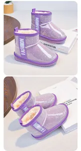 Detailed view of girls' purple sparkly snow boots with thick warm fleece lining and Fashion logo