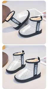 Macro detail view of sparkly white girls' snow boots with thick cozy fur lining