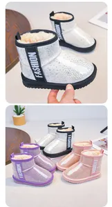 Detailed view of girls' sparkly waterproof snow boots with faux fur lining in multiple colors