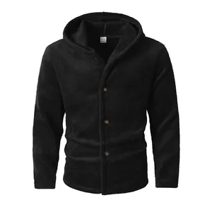 Macro view of black coral fleece hooded jacket showing warm fuzzy texture and buttons