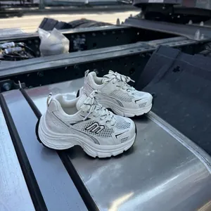 Stylish white children's chunky sneakers with breathable mesh for boys and girls