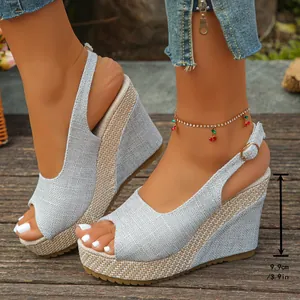 Stylish silver peep toe wedge sandals with a 9.9cm woven platform heel for summer