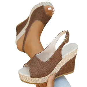 Women's brown linen peep-toe wedge sandals featuring elegant braided platform sole