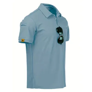 Detail view of a men's light blue quick-dry golf polo shirt with sunglasses prop.