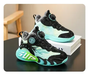 Detail of boy's green basketball shoe with rotating dial lace and flame design