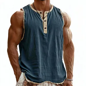 Detailed view of men's blue-grey Henley tank top with contrast trim and textured fabric